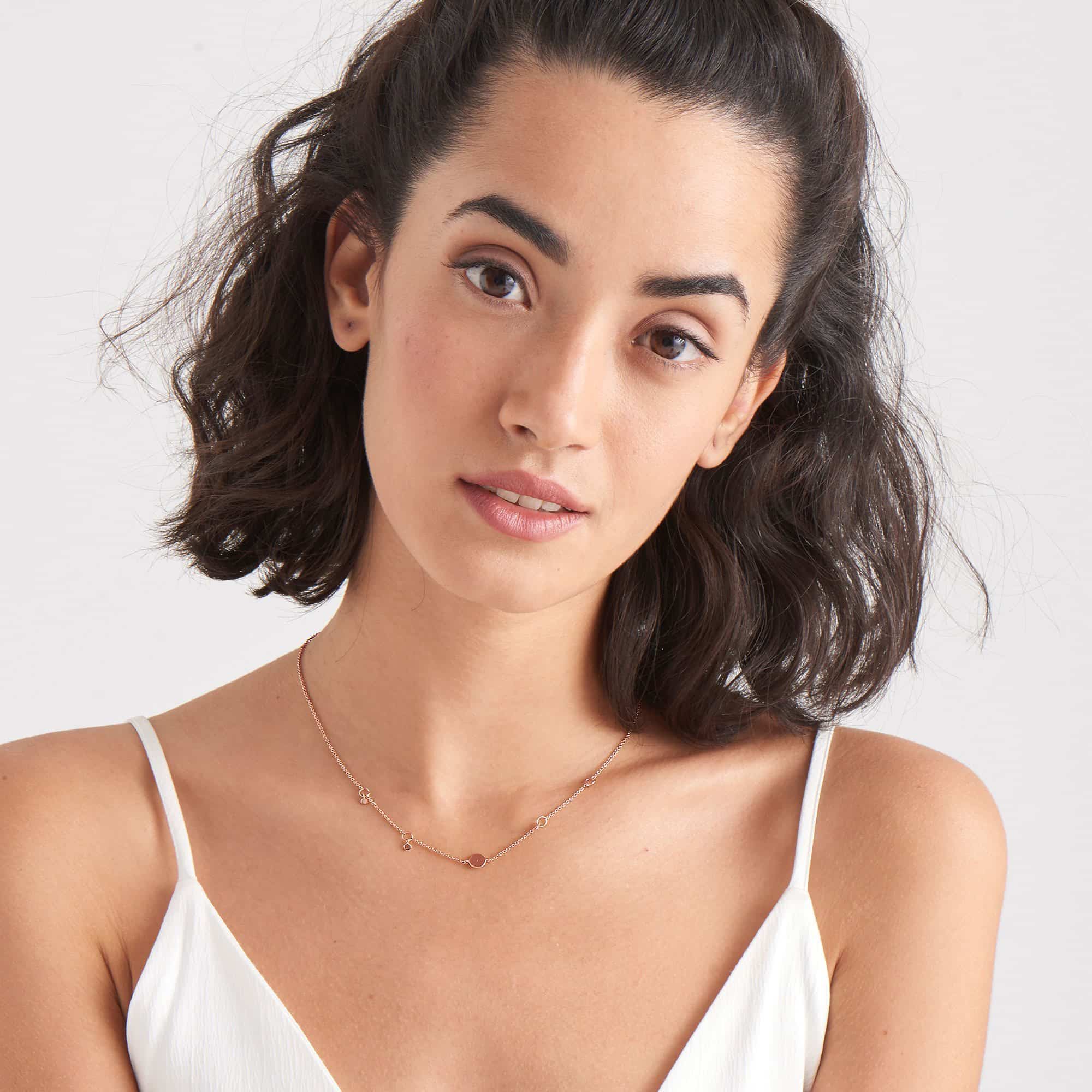 geometry drop discs necklace on model