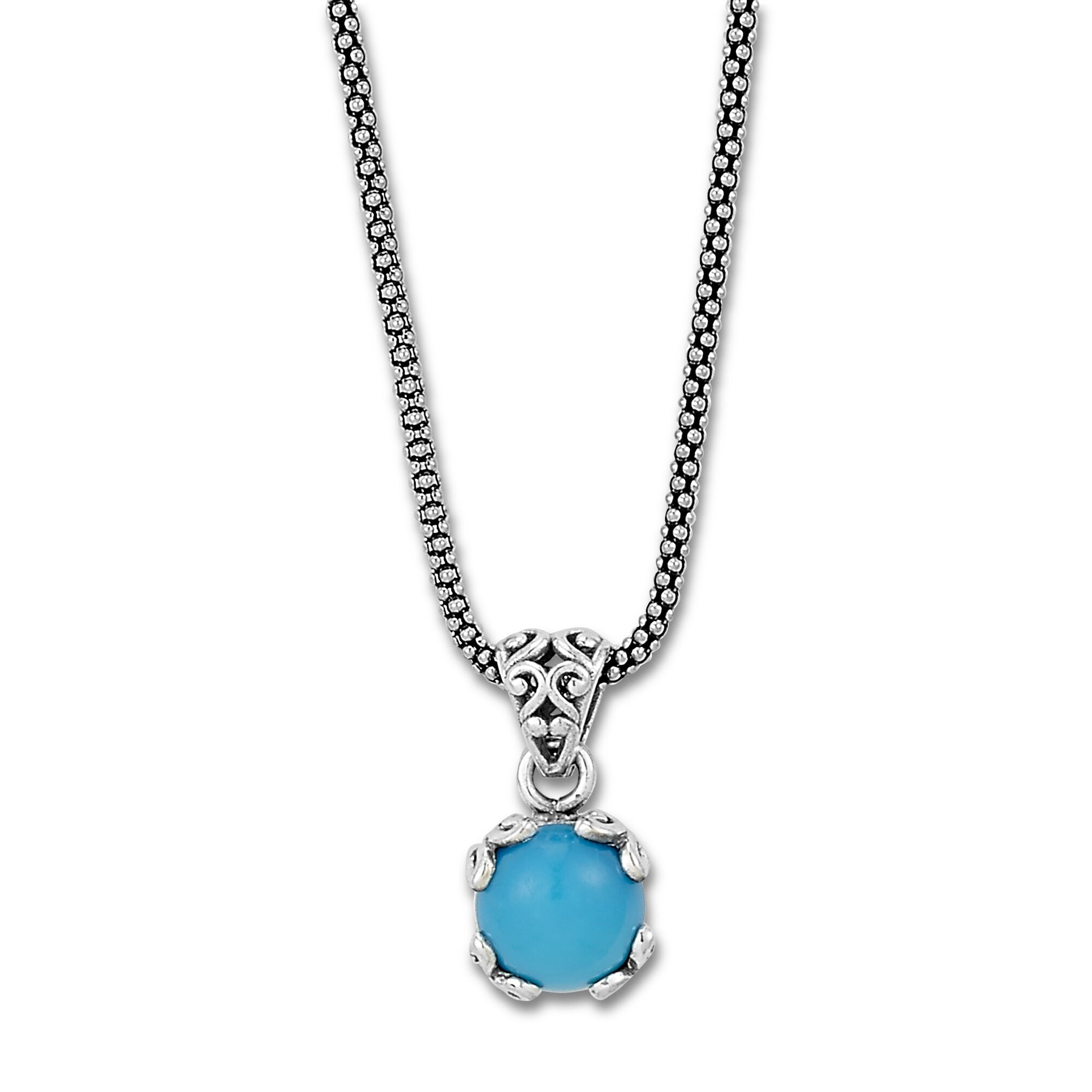 A sterling silver pendant necklace set with a solitaire round cabochon Sleeping Beauty turquoise