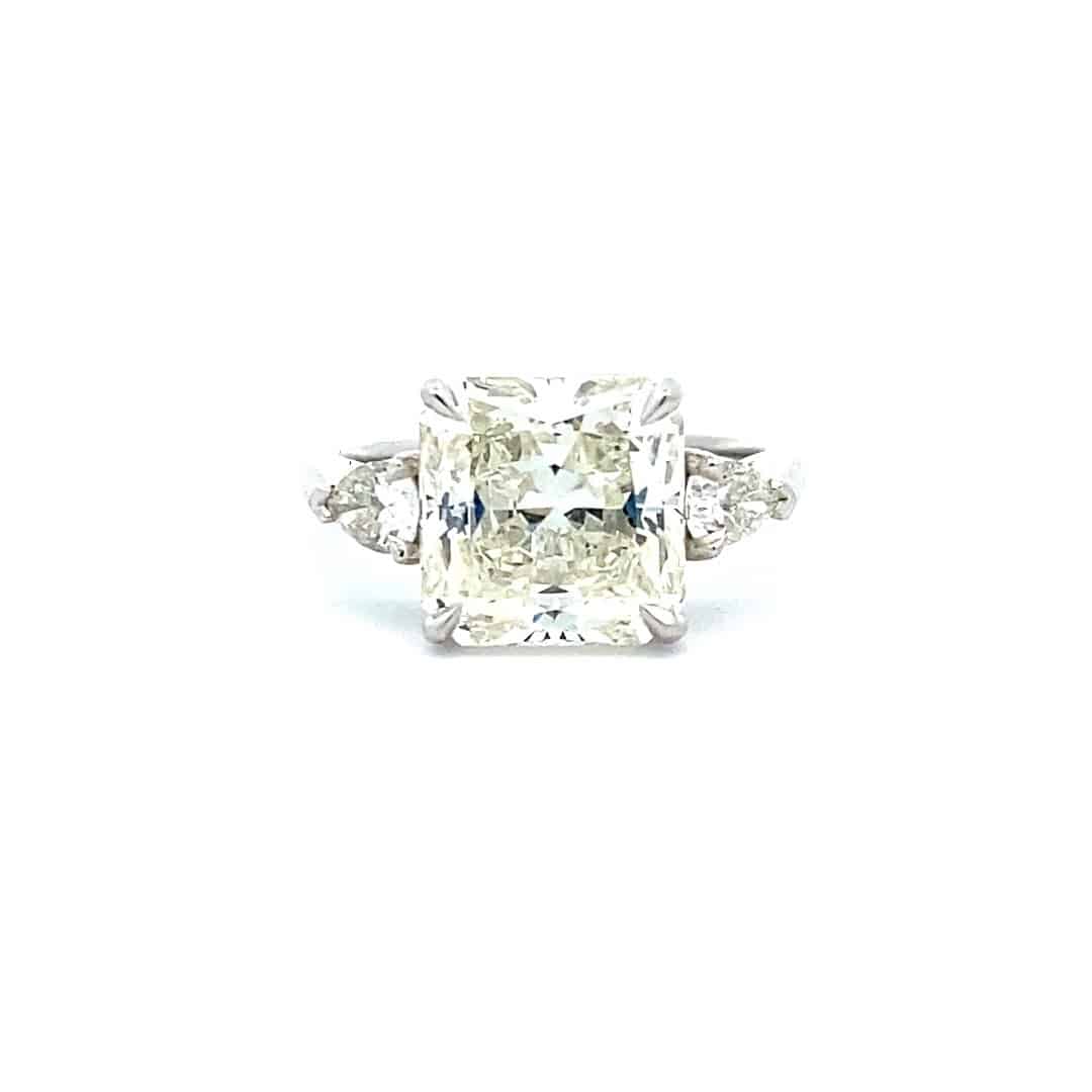 Radiant and Pear Three-Stone Diamond Engagement Ring in Platinum
