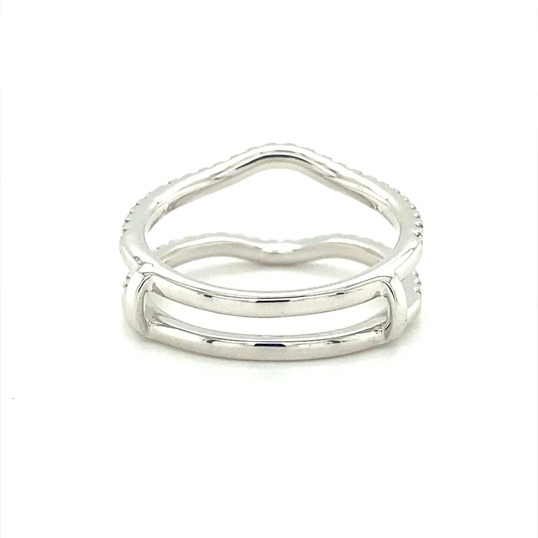 One (1) 14 karat white gold and diamond ring guard featuring fifty-four (54) round brilliant diamonds weighing 0.45 carats total weight with matching G-H color and VS2-SI1 clarity, prong-set in a curved fitted style ring guard with two shanks connected at the bottom. The ring guard is open to be able to insert a ring in between the two curved shanks. The ring is a finger size 7.5.