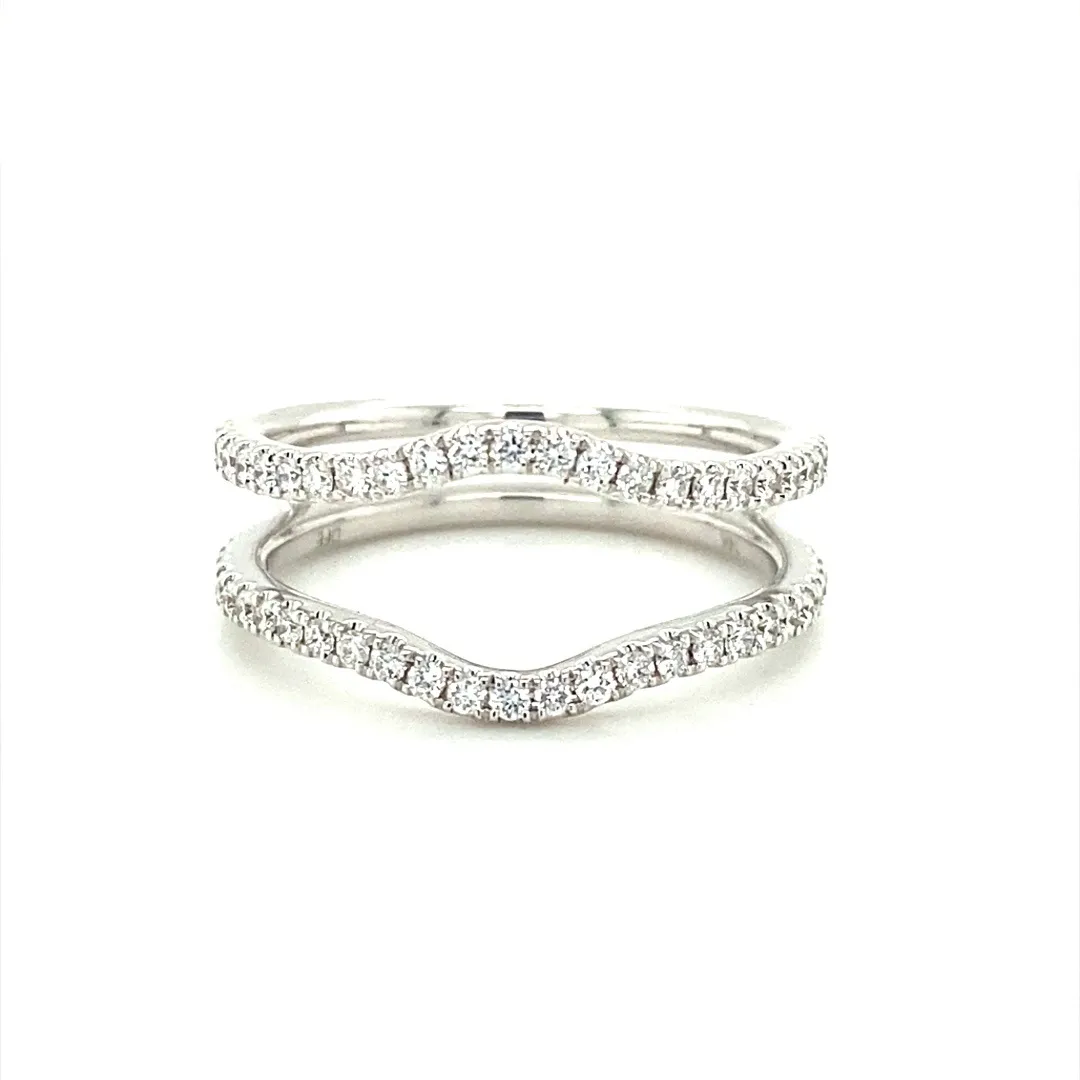 One (1) 14 karat white gold and diamond ring guard featuring fifty-four (54) round brilliant diamonds weighing 0.45 carats total weight with matching G-H color and VS2-SI1 clarity, prong-set in a curved fitted style ring guard with two shanks connected at the bottom. The ring guard is open to be able to insert a ring in between the two curved shanks. The ring is a finger size 7.5.