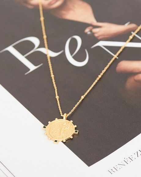 gold toned victory goddess necklace