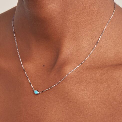 Synthetic Turquoise Wave Necklace by Ania Haie - silver tone on model