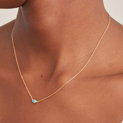 Synthetic Turquoise Wave Necklace by Ania Haie - gold tone on model
