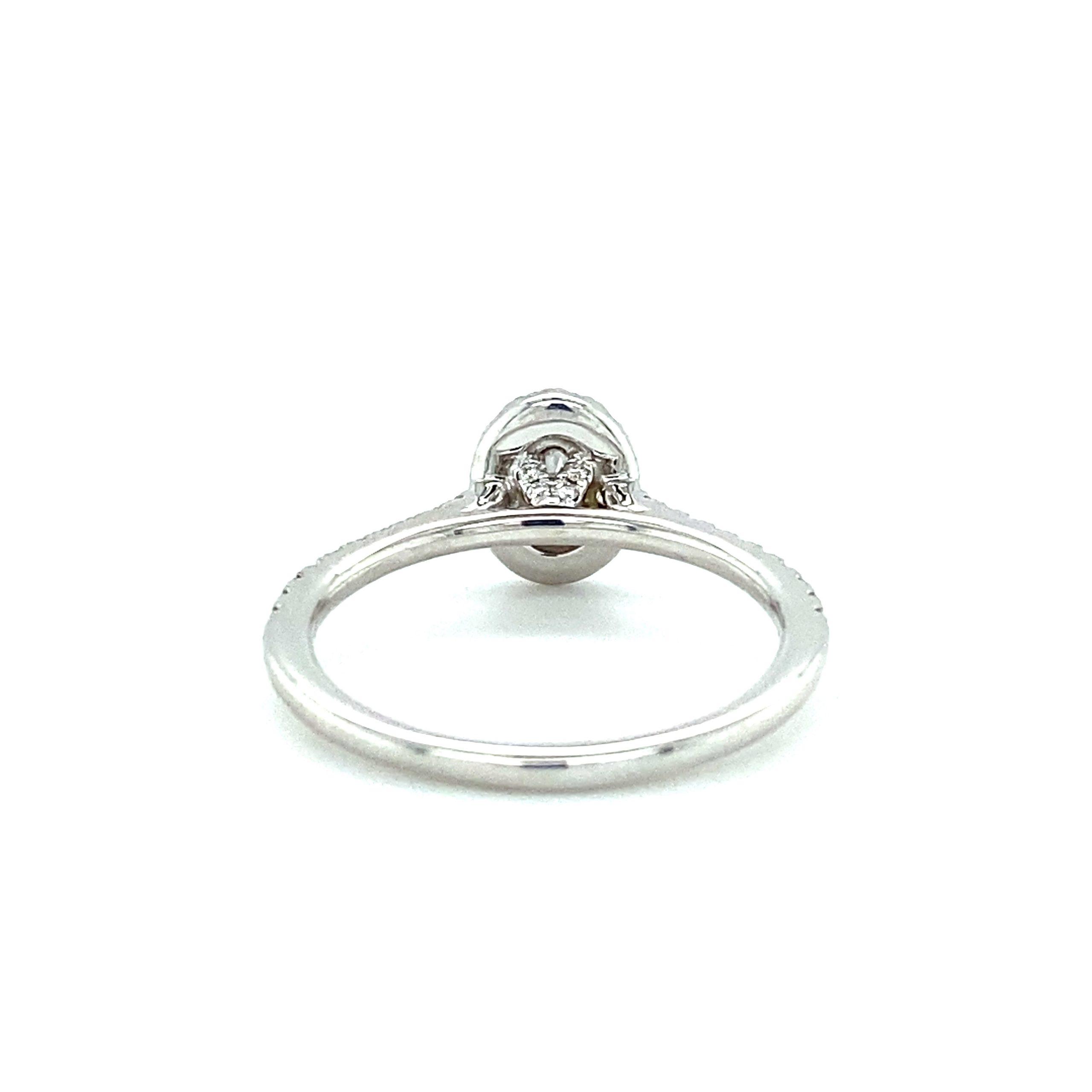 14K White Gold 0.57CTW Oval Diamond Halo Engagement Ring by Martin Flyer - Image 3